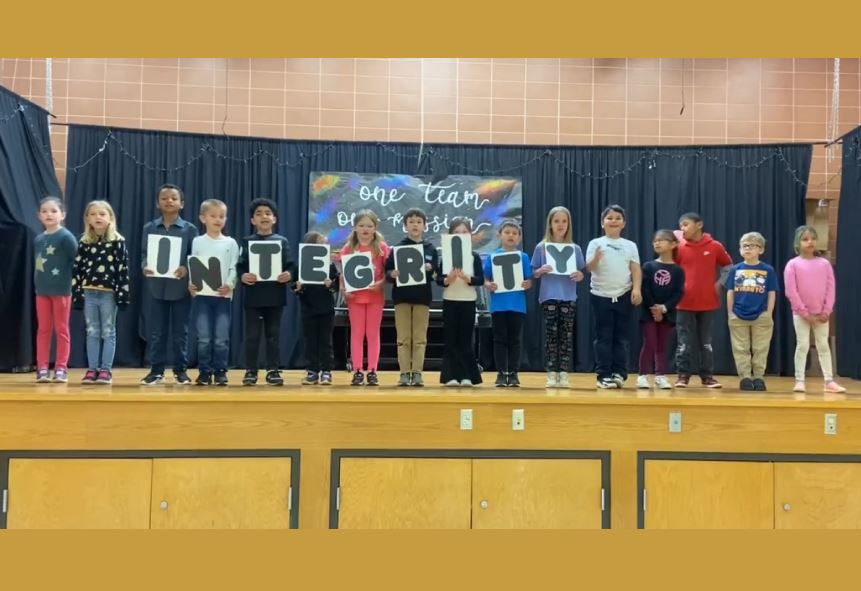  Richmond students present the word of the week "Integrity"